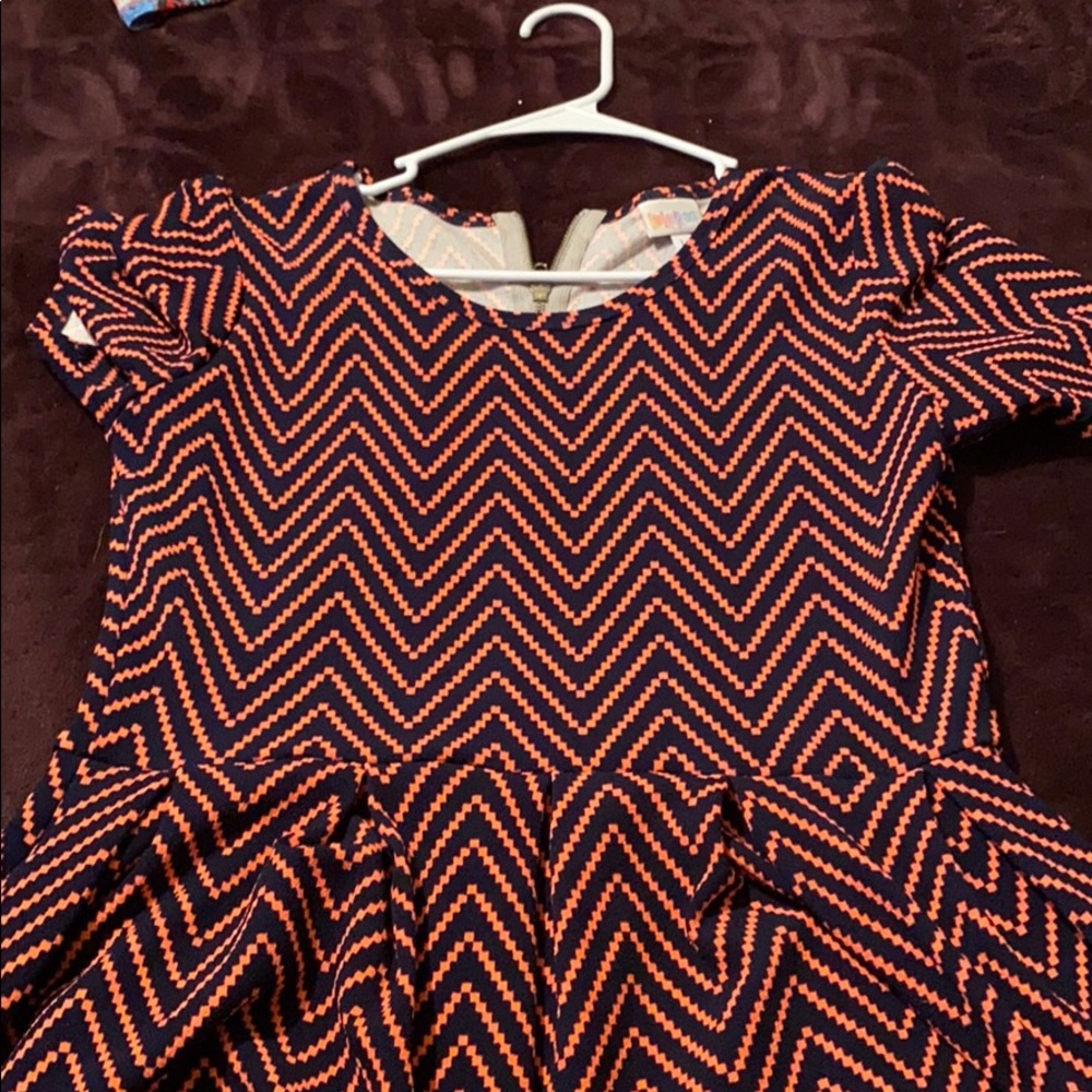 Woman’s dress with pockets and zipper back